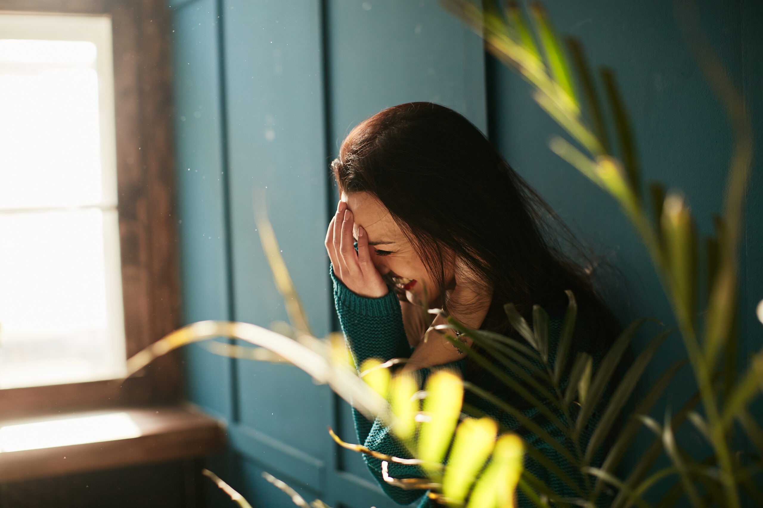 Emotional woman in reflection